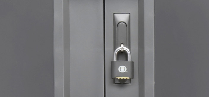a padlock securing the door of a Bretford charging cart